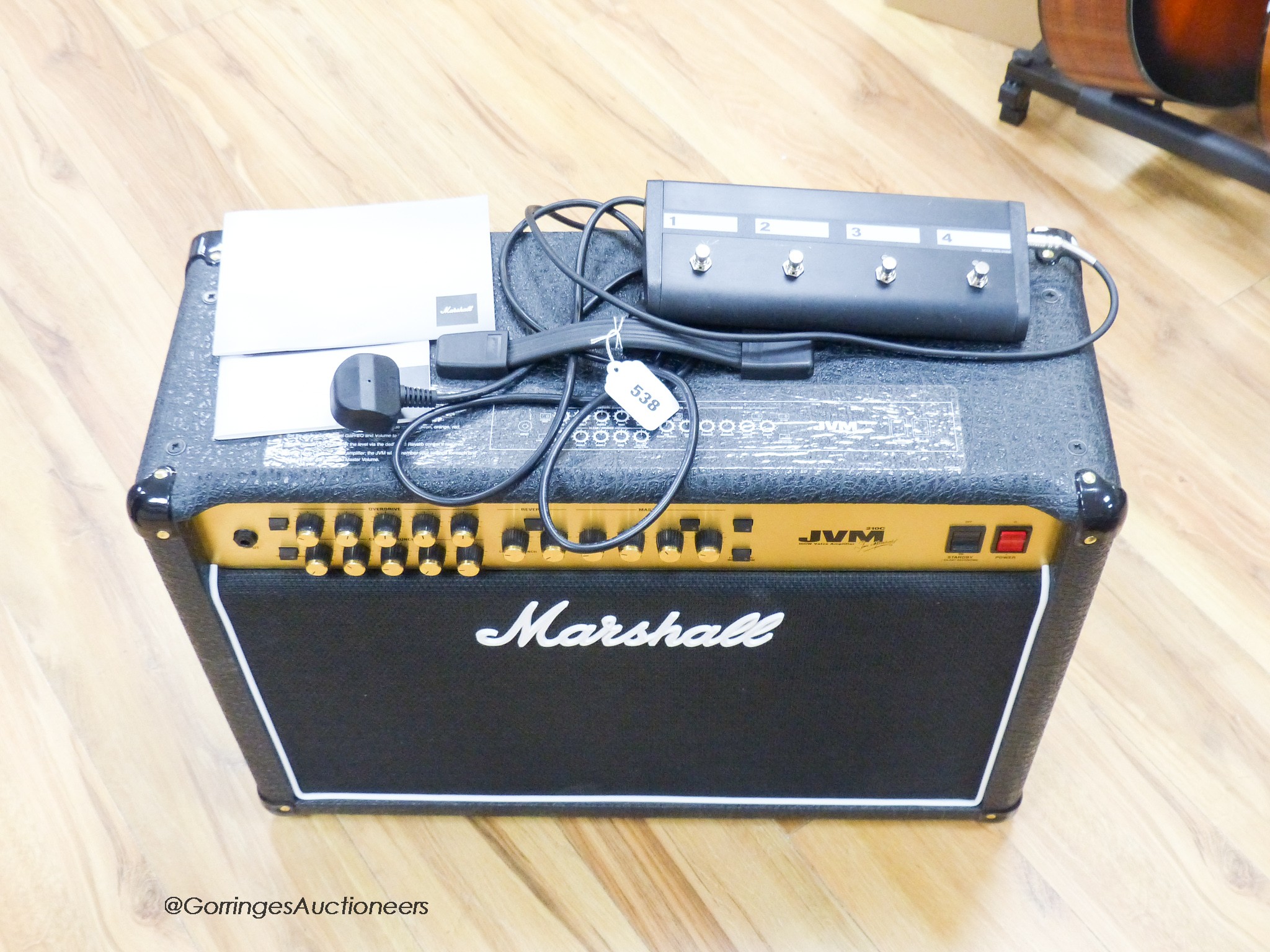 A Marshall JVM 210C 100 V valve amplifier with 4 way foot switch, c.2019